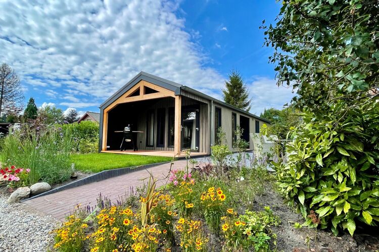 Chalet met Kitami Oak panelen