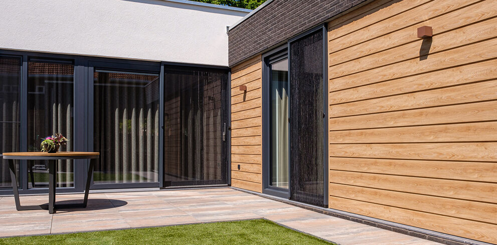 Gevelbekleding op patiowoning in Uden